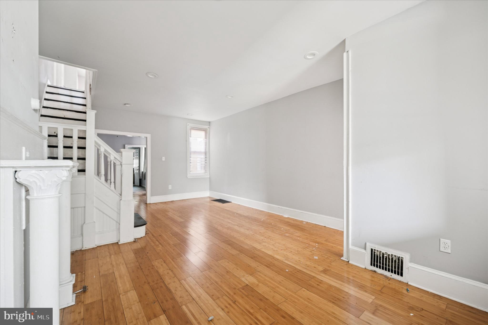 809 East Locust Avenue Philadelphia, PA 19138 - Photo 10 of 23 a view of empty room with wooden floor and fan