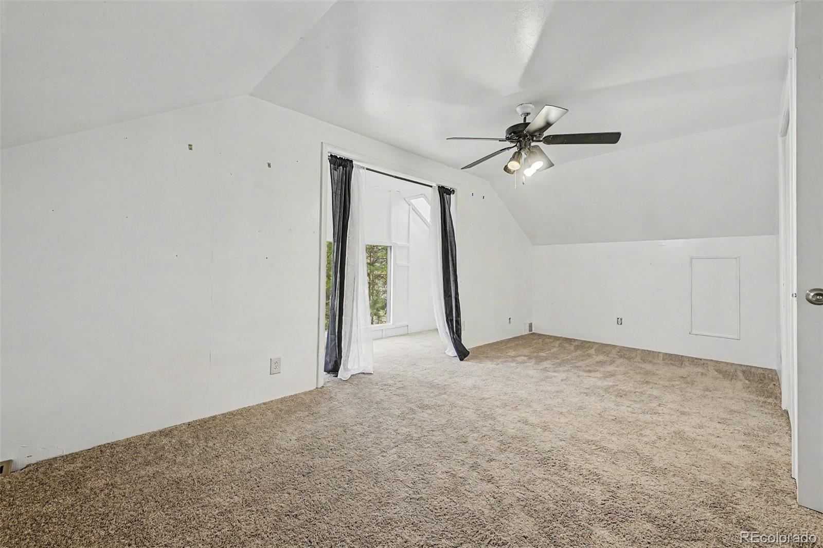 145 Bailey Drive Bailey, CO 80421 - Photo 12 of 31 a view of a room with an empty space