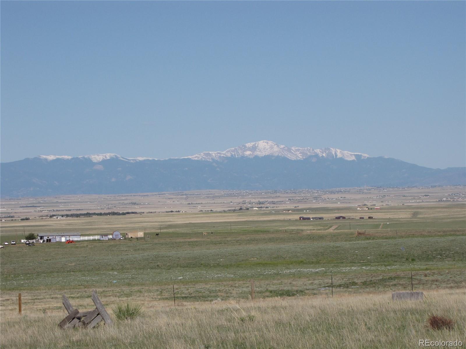 31755 Vorenberg Road Calhan, CO 80808 - Photo 8 of 10 a view of an ocean beach and mountain