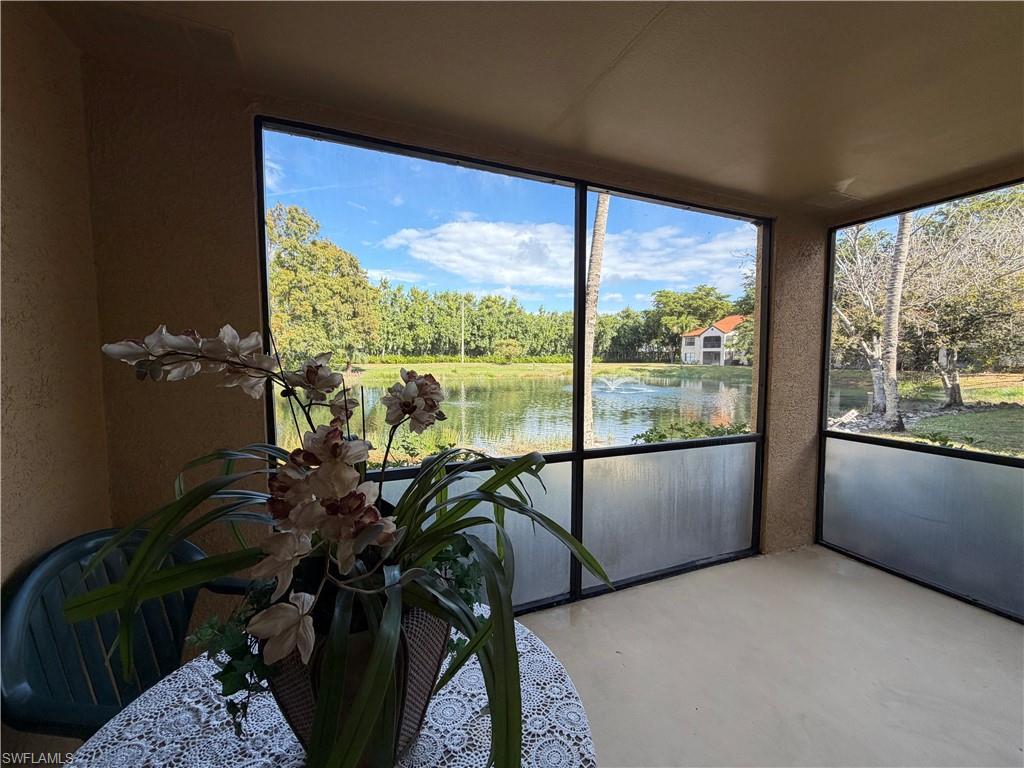 2070 Arbour Walk Circle, Unit 3214 Naples, FL 34109 - Photo 11 of 12 a view of a room with gym equipment
