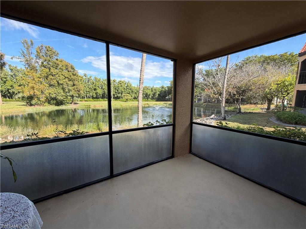 2070 Arbour Walk Circle, Unit 3214 Naples, FL 34109 - Photo 9 of 12 a view of a large window with an outdoor view