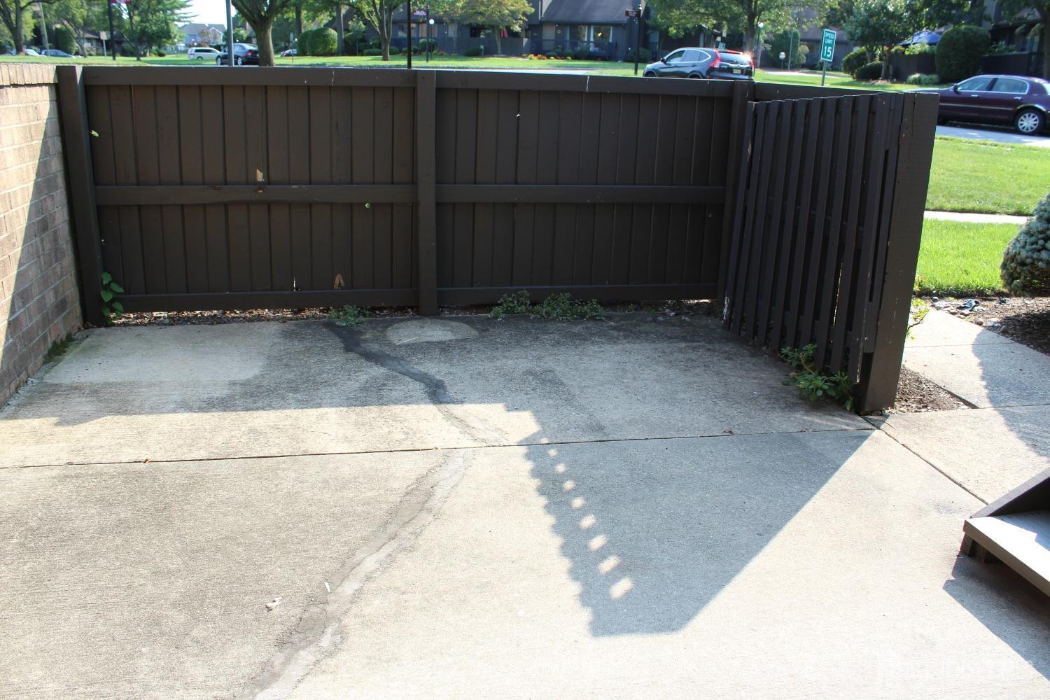 157 Westgate Drive Edison, NJ 08820 - Photo 14 of 40 a view of outdoor space and wooden fence