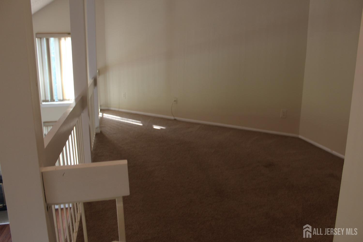 157 Westgate Drive Edison, NJ 08820 - Photo 26 of 40 a view of a hallway with seating area