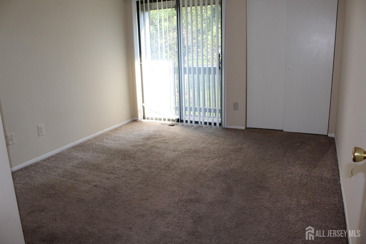 157 Westgate Drive Edison, NJ 08820 - Photo 27 of 40 a view of an empty room with a window