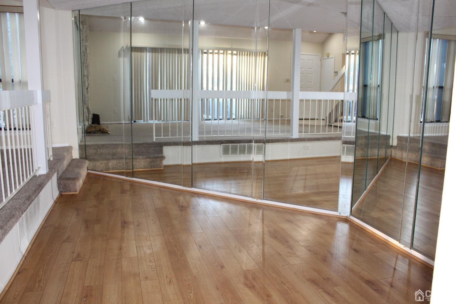 157 Westgate Drive Edison, NJ 08820 - Photo 5 of 40 a view of an entryway with wooden floor