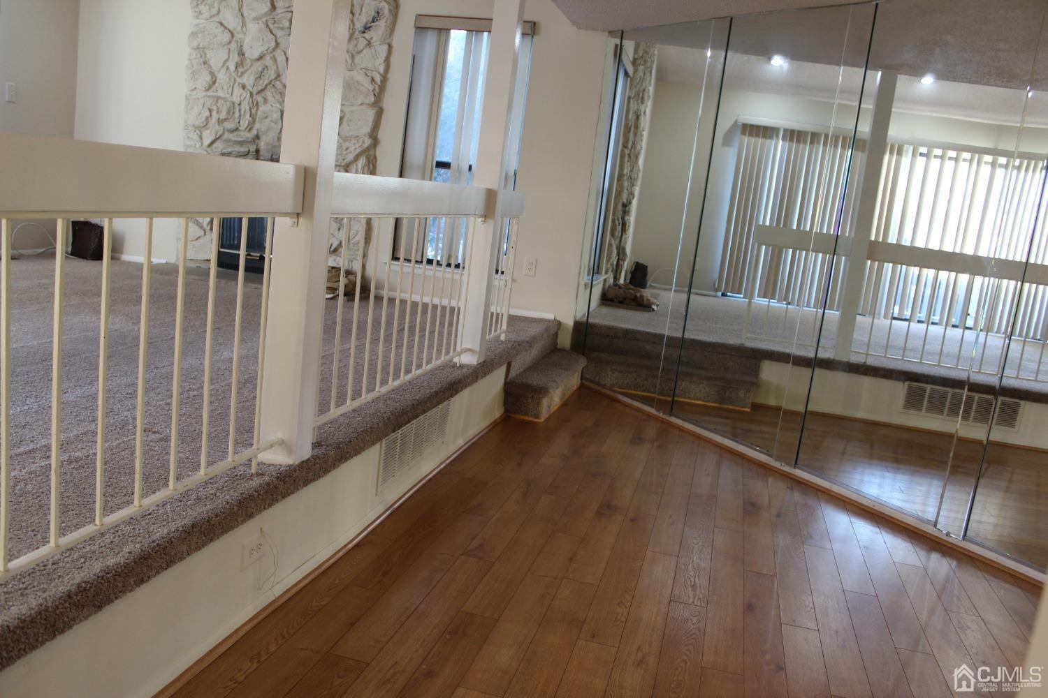 157 Westgate Drive Edison, NJ 08820 - Photo 9 of 40 a view of staircase with rug floor