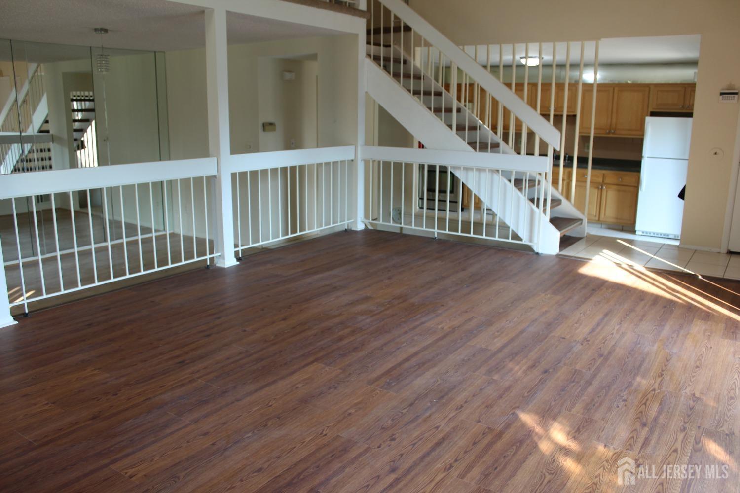 157 Westgate Drive Edison, NJ 08820 - Photo 10 of 40 a view of entryway with wooden floor