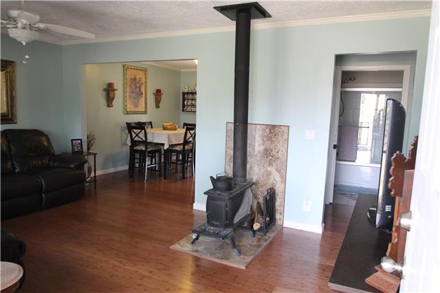 7470 Shoals Branch Road Primm Springs, TN 38476 - Photo 5 of 12 a view of a livingroom with furniture and a window