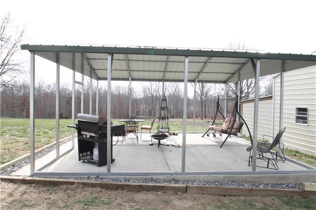 7470 Shoals Branch Road Primm Springs, TN 38476 - Photo 10 of 12 a view of outdoor space with seating area