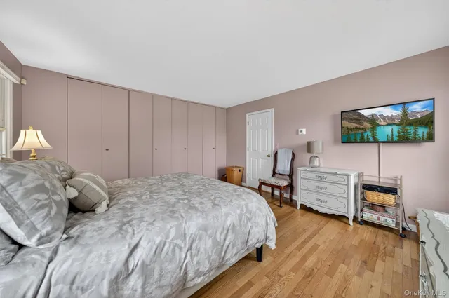 a bedroom with a bed and furniture