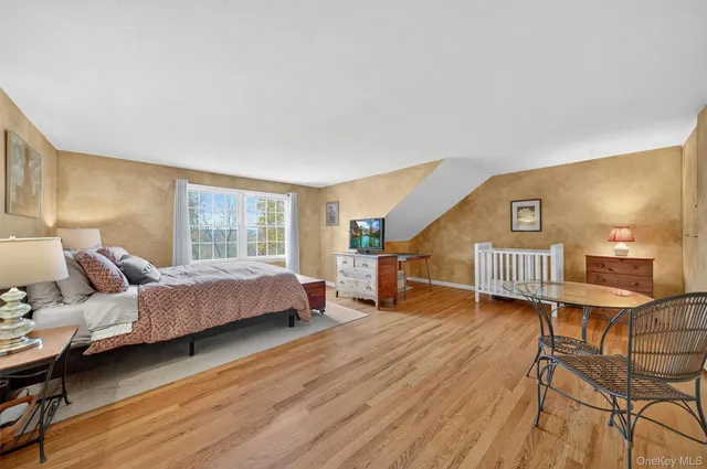 a bathroom with a sink a toilet and a window