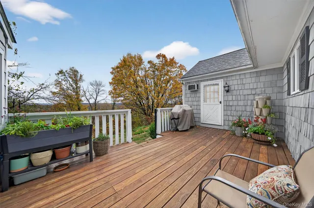 a backyard of a house with seating space
