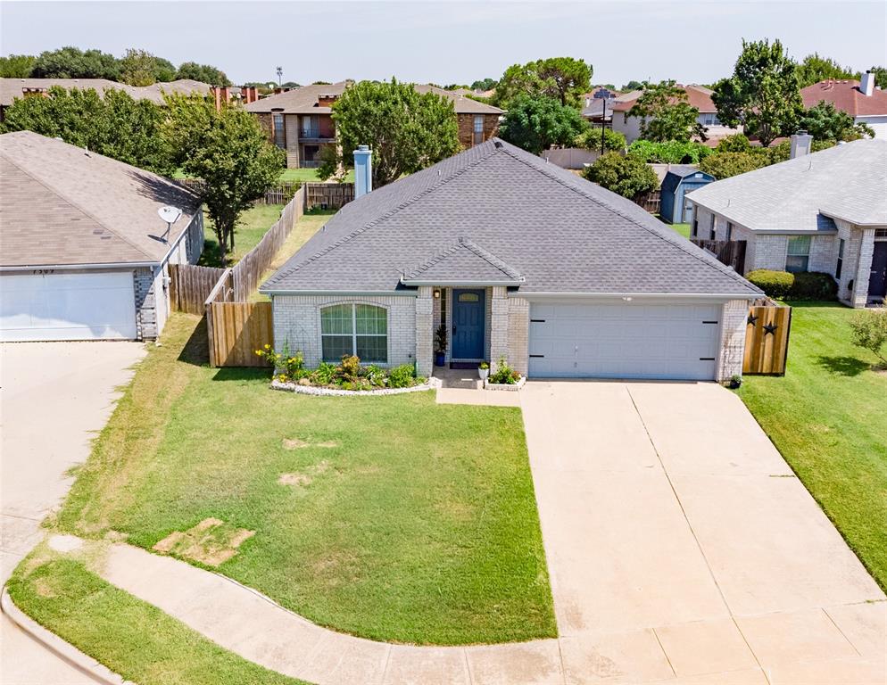 7313 Diamond Springs Trail Fort Worth, TX 76123 - Photo 1 of 40 a house view with a garden space