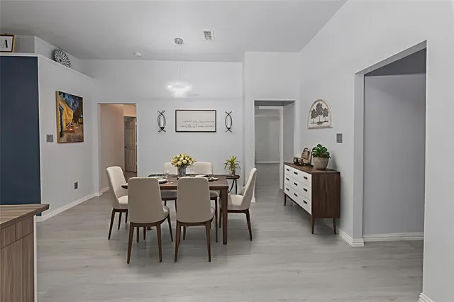 a view of a dining room with furniture