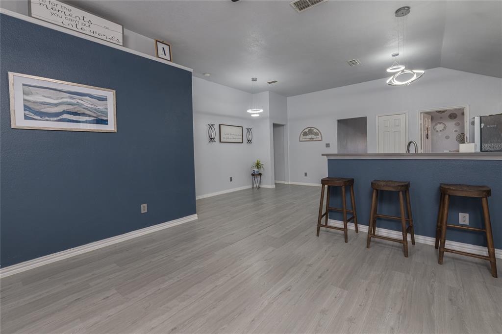 7313 Diamond Springs Trail Fort Worth, TX 76123 - Photo 17 of 40 a view of a livingroom with furniture and wooden floor