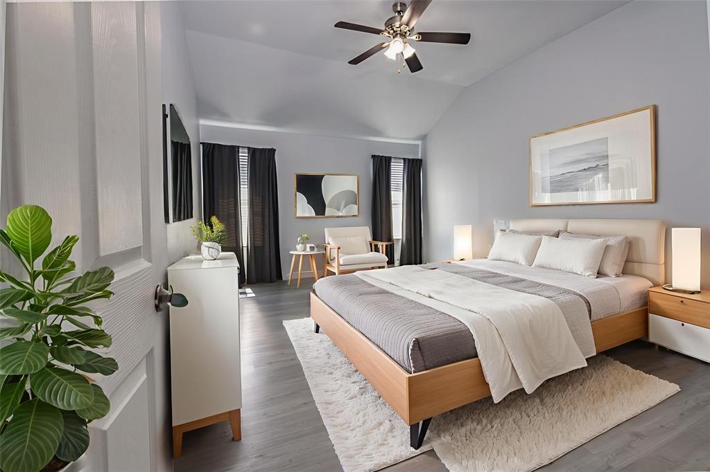 7313 Diamond Springs Trail Fort Worth, TX 76123 - Photo 22 of 40 a bedroom with bed and a potted plant