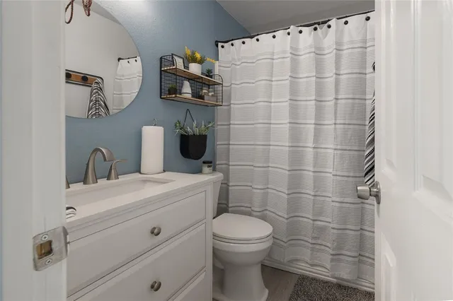 a view of a room with racks on the wall