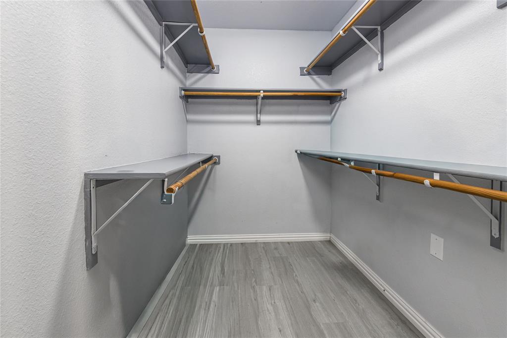 7313 Diamond Springs Trail Fort Worth, TX 76123 - Photo 34 of 40 a view of a room with racks on the wall