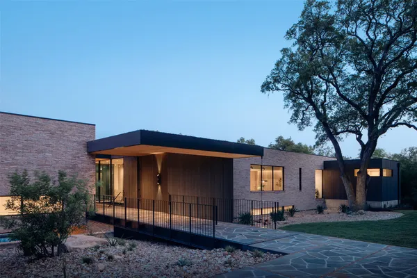 an aerial view of a house with outdoor space