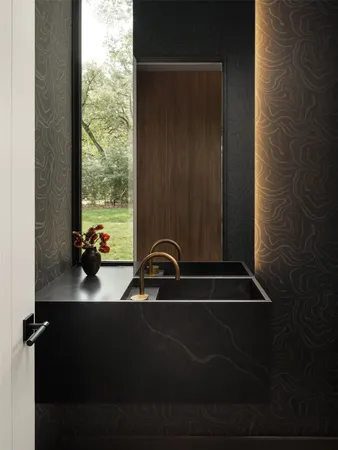 a room with a window and a potted plant on the table