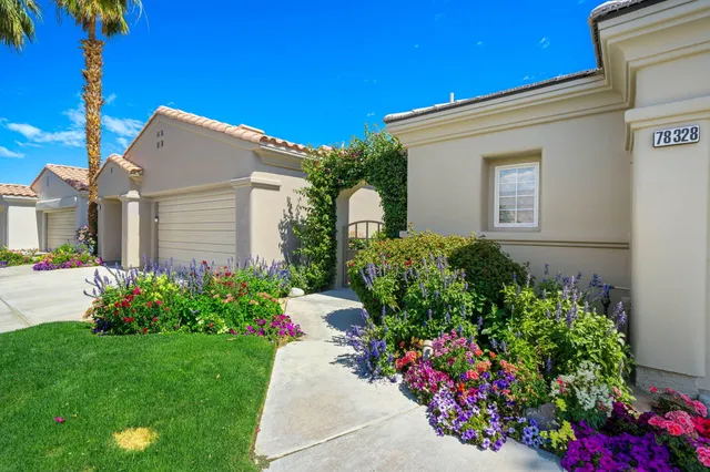 a house view with a garden space