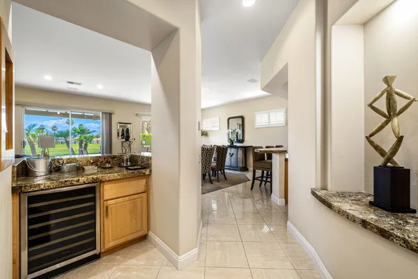 a kitchen with stainless steel appliances granite countertop a stove and a sink