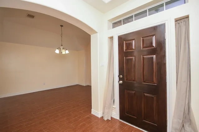 an empty room with windows