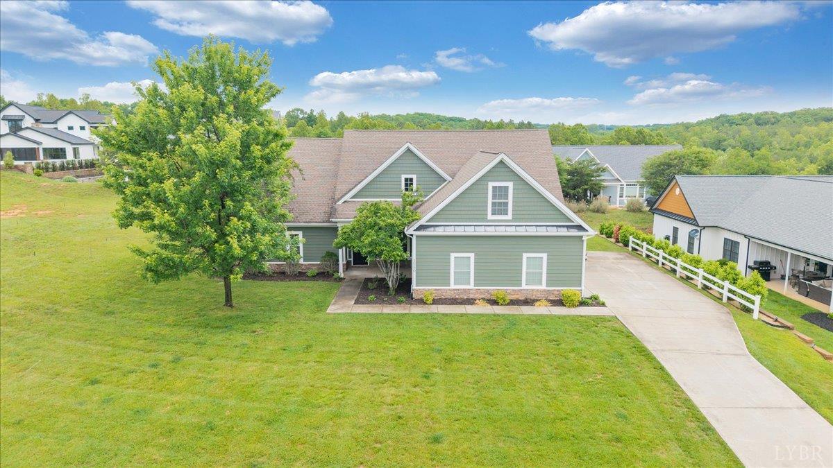 1250 Our Cove Road Huddleston, VA 24104 - Photo 63 of 70 a view of house with a big yard and potted plants
