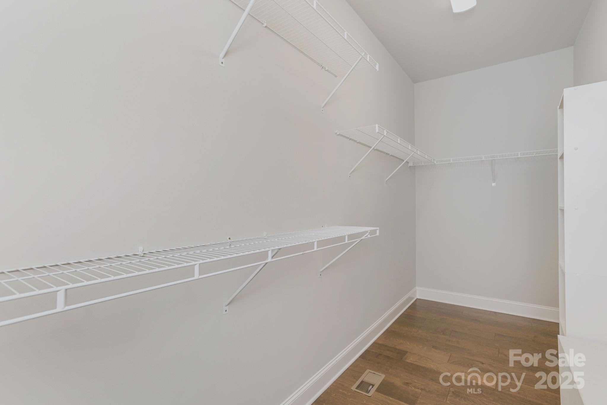 76 Tryon View Drive Flat Rock, NC 28731 - Photo 18 of 30 a view of a room with racks on the wall