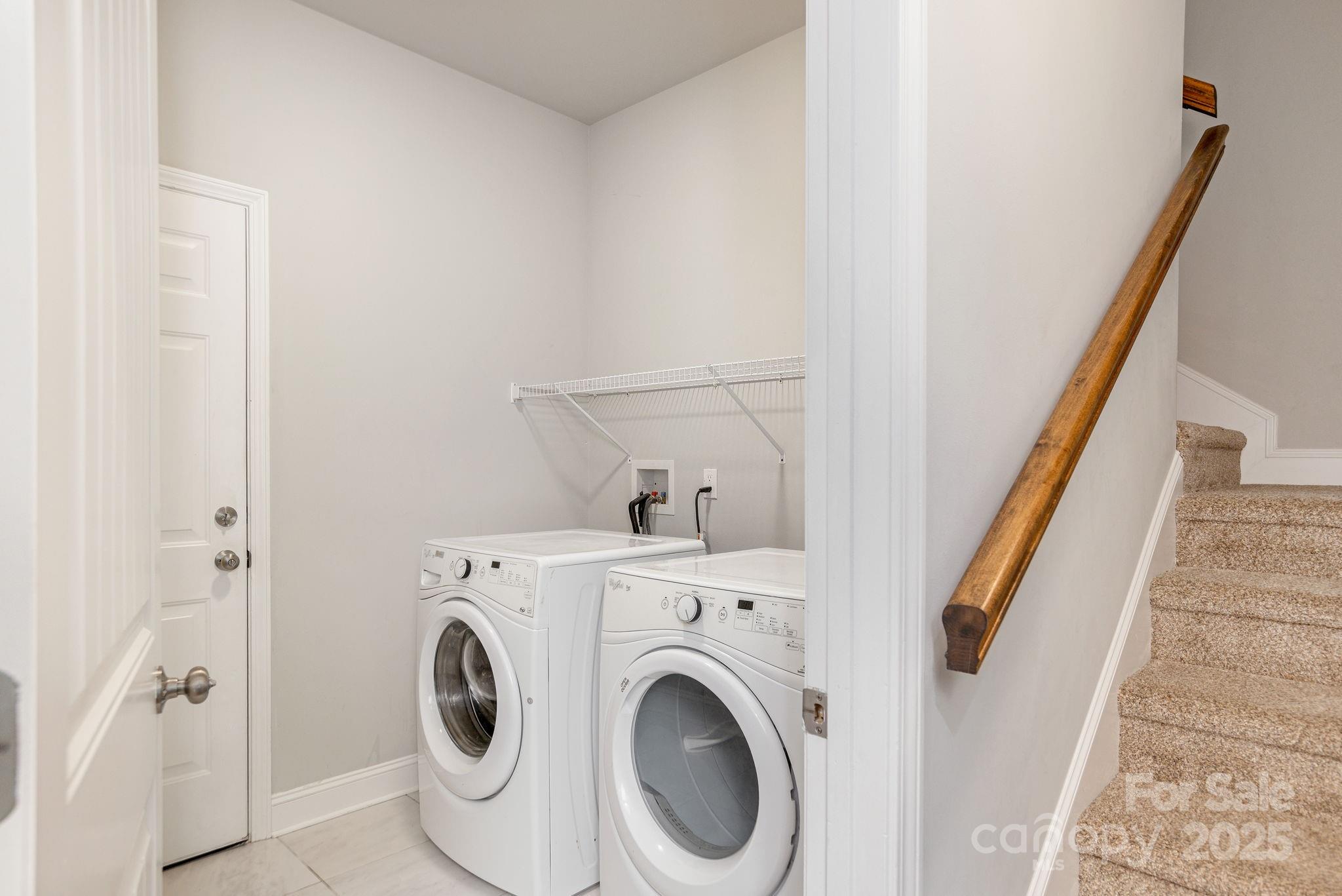 76 Tryon View Drive Flat Rock, NC 28731 - Photo 25 of 30 a view of hallway with washer and dryer