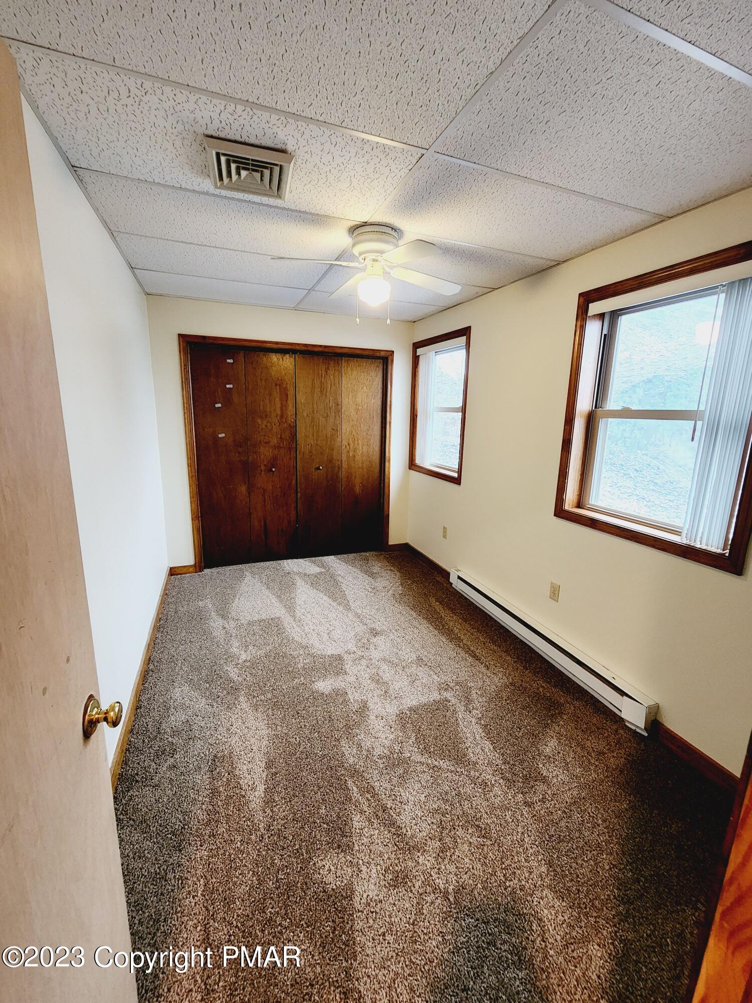 216 Friemann Lane Sciota, PA 18354 - Photo 5 of 7 a view of an empty room with a window