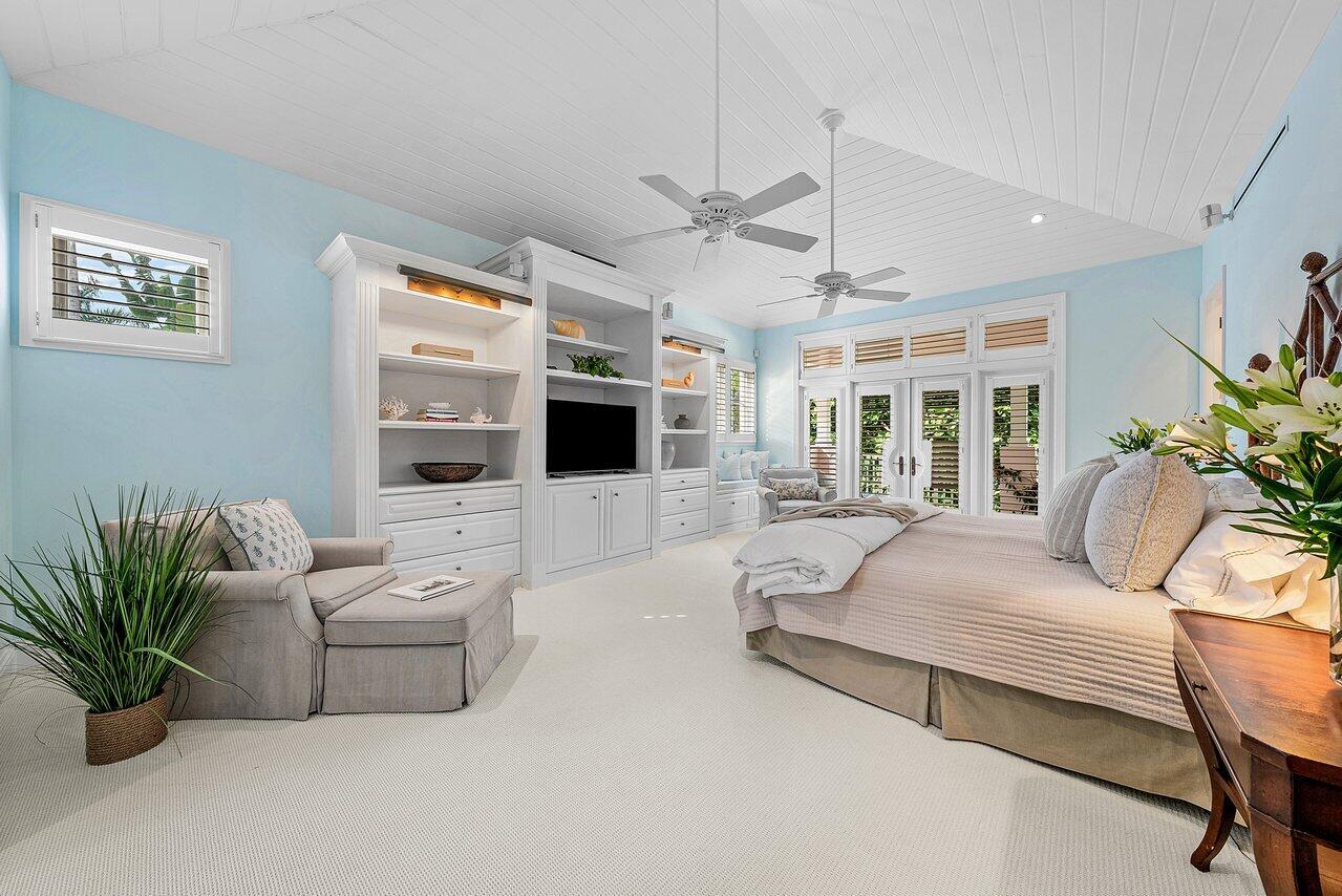 3138 Gulf Stream Road Gulf Stream, FL 33483 - Photo 15 of 49 a bedroom with furniture and a large window