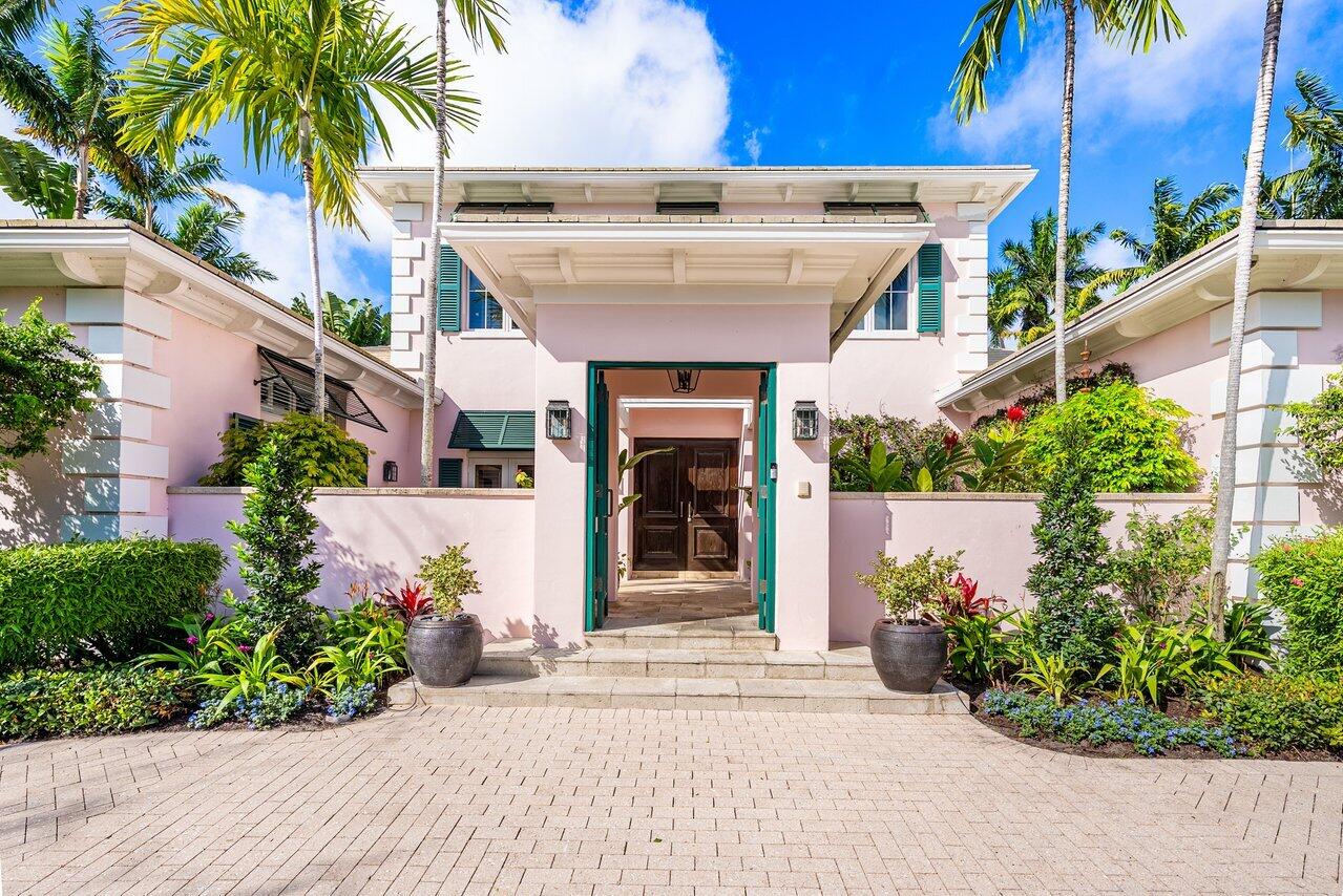 3138 Gulf Stream Road Gulf Stream, FL 33483 - Photo 2 of 49 a front view of a house with garden