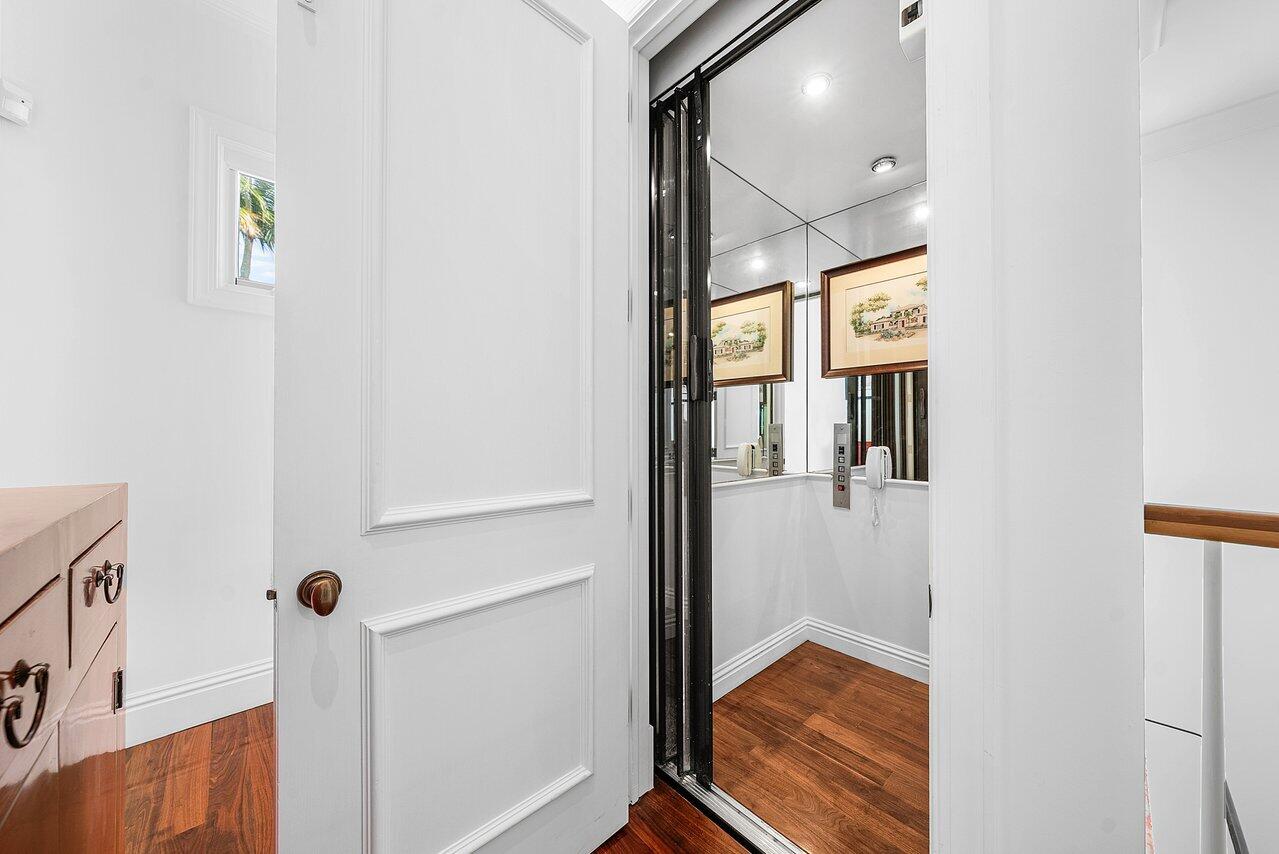 3138 Gulf Stream Road Gulf Stream, FL 33483 - Photo 23 of 49 a view of an entryway with wooden floor
