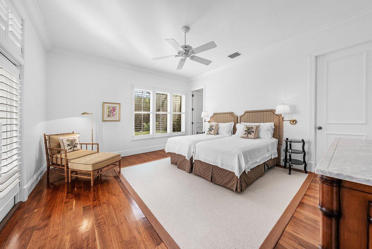 3138 Gulf Stream Road Gulf Stream, FL 33483 - Photo 24 of 49 a bedroom with a bed and a window