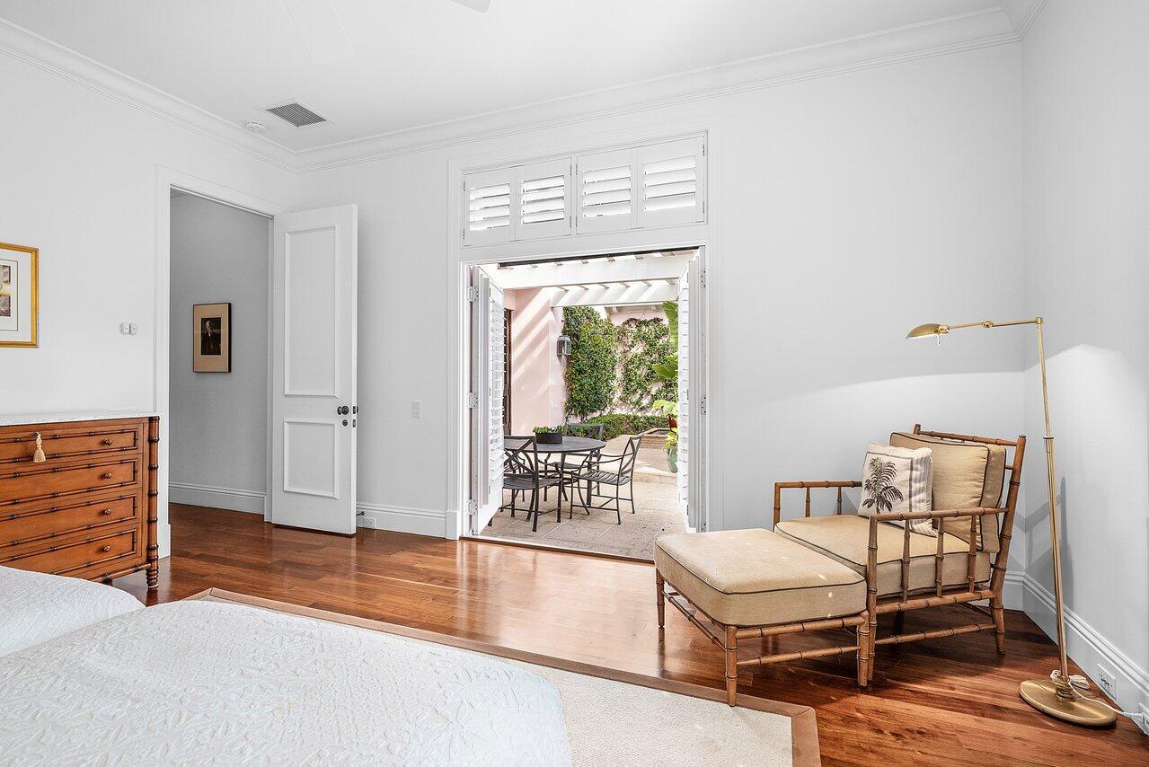 3138 Gulf Stream Road Gulf Stream, FL 33483 - Photo 25 of 49 a room with a bed and a table in it