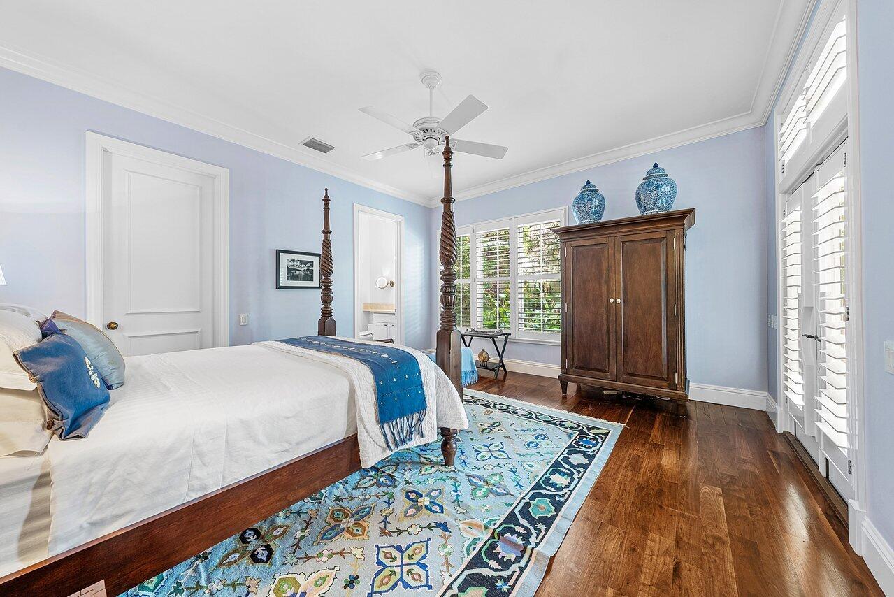 3138 Gulf Stream Road Gulf Stream, FL 33483 - Photo 28 of 49 a bedroom with bed and window