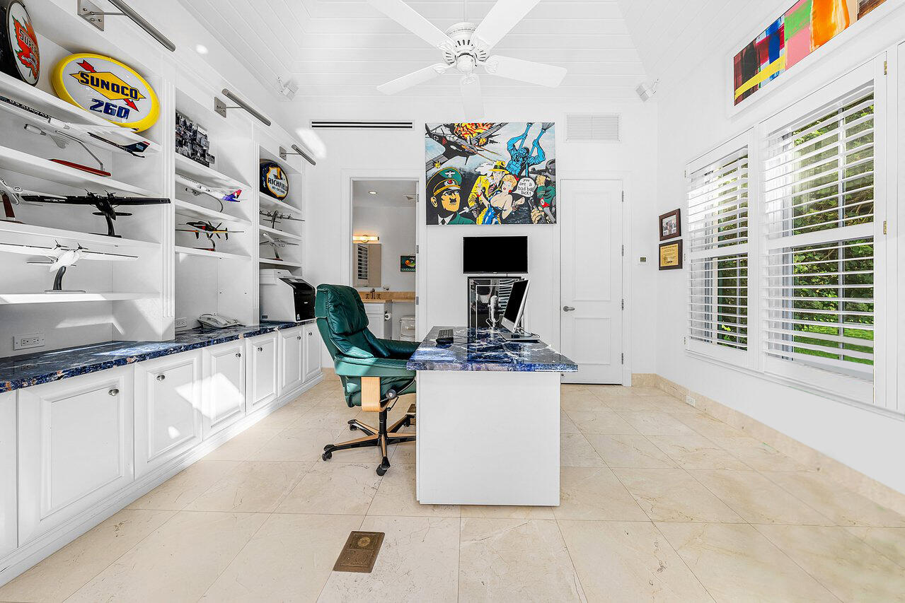 3138 Gulf Stream Road Gulf Stream, FL 33483 - Photo 37 of 49 a view of a workspace with furniture and a window