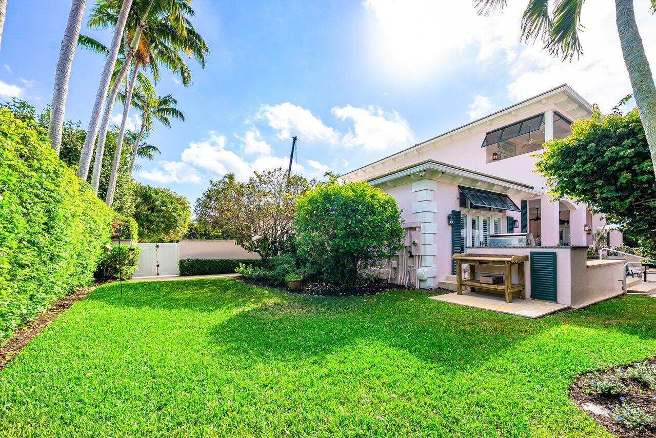 3138 Gulf Stream Road Gulf Stream, FL 33483 - Photo 41 of 49 a view of a house with a yard and sitting area