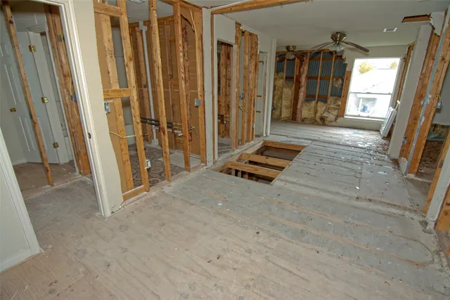 a view of a closet area with tub