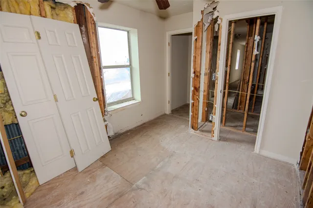 an empty room with windows