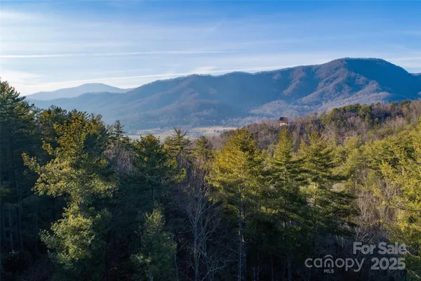 a view of mountains and valleys