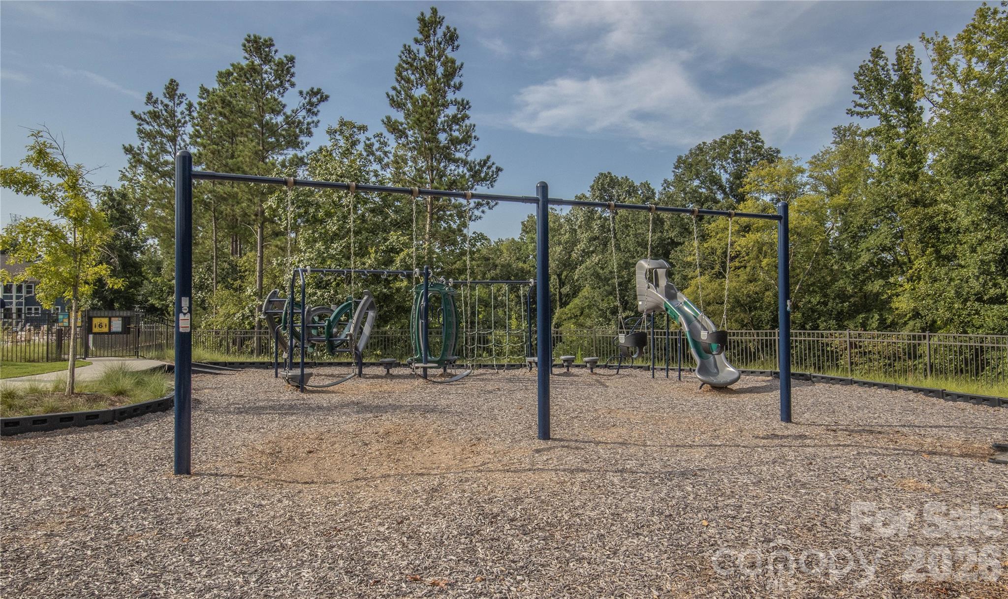 1633 Half Pint Loop Fort Mill, SC 29708 - Photo 47 of 48 a view of a park with swings