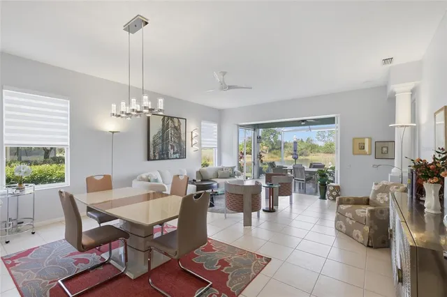 a bathroom with a double vanity sink mirror and shower
