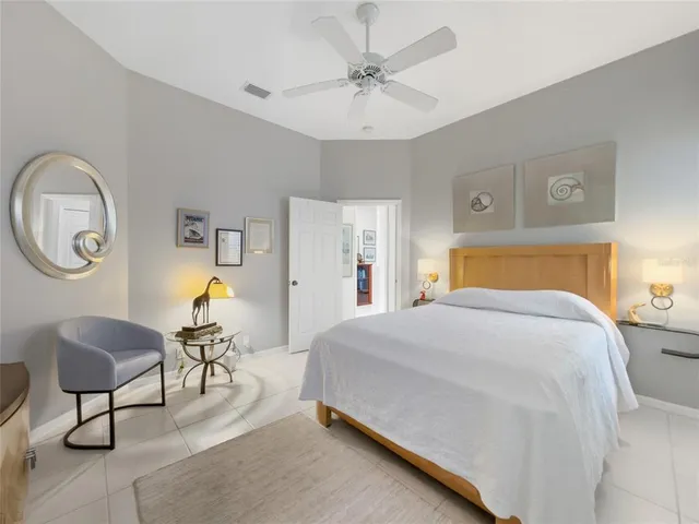 an aerial view of a house with a yard basket ball court and outdoor seating