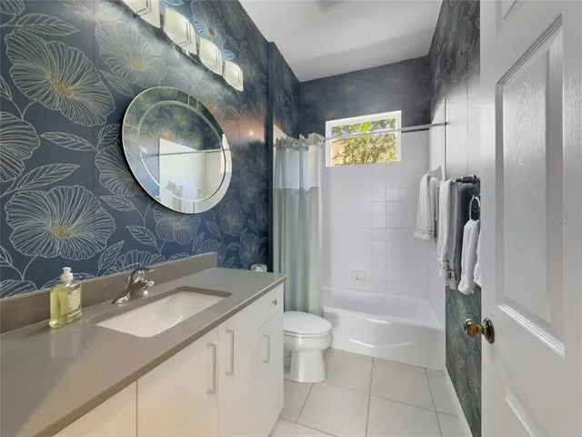 a view of a swimming pool with an outdoor seating