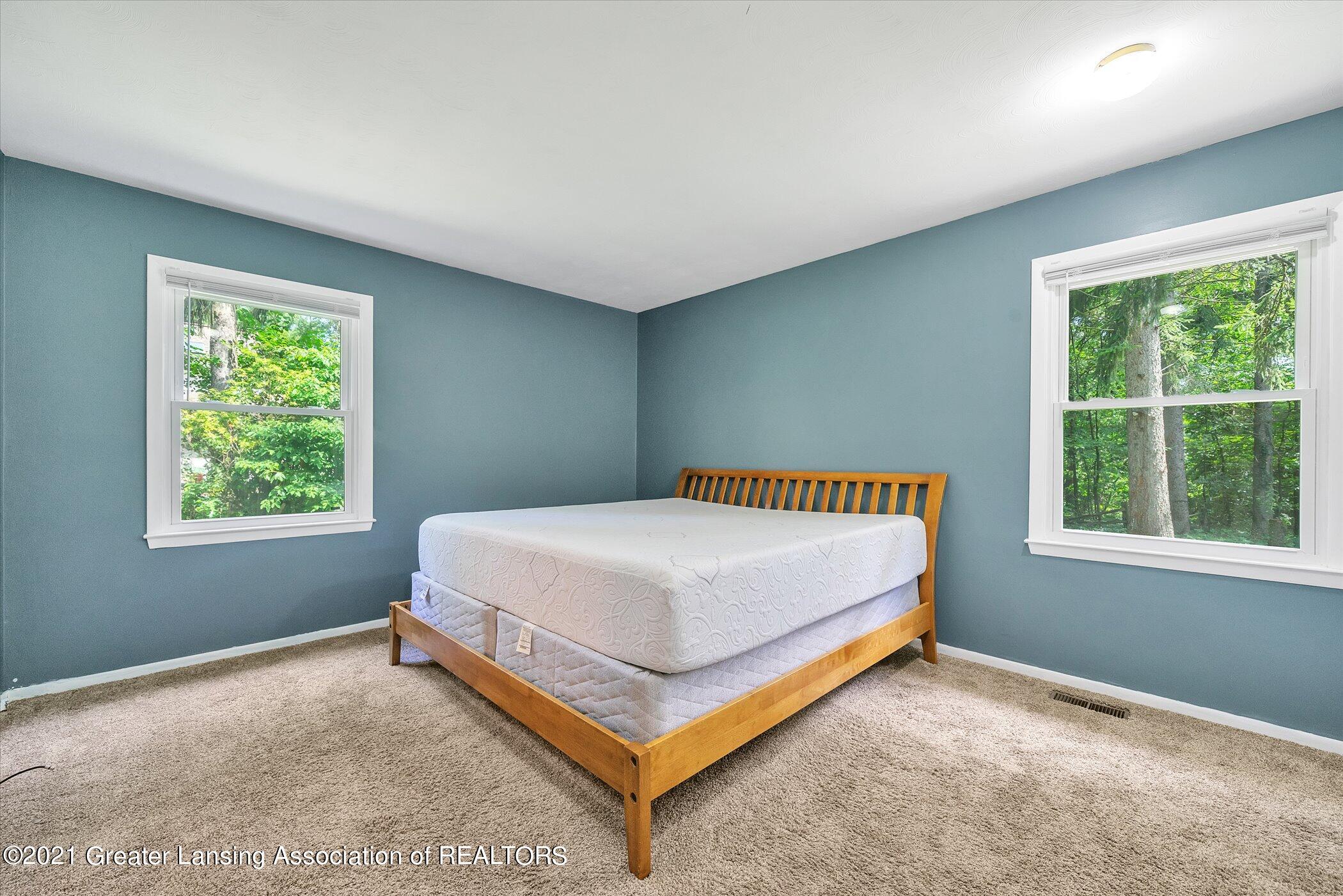 12159 Pine Ridge Drive Perry, MI 48872 - Photo 26 of 40 26-12159-Pine-Ridge-Dr-WindowStill-Real-