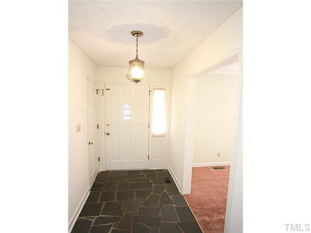 4512 Connell Drive Raleigh, NC 27612 - Photo 2 of 25 Slate Flooring in Foyer. Hardwoods under carpet.... "hardwoods in LR, DR, FR, All Bedrooms on main level." Foyer