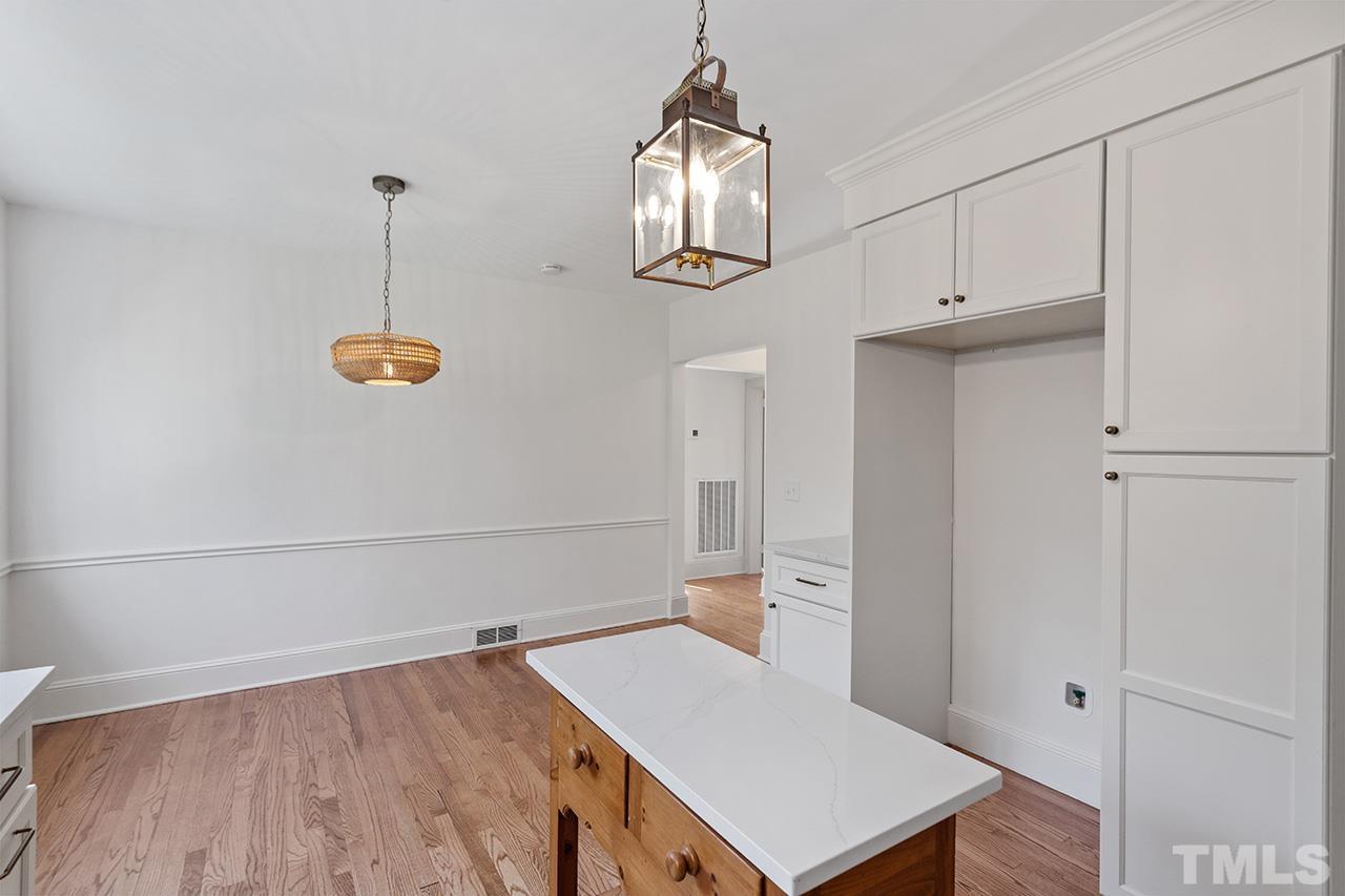 704 Dixie Trail Raleigh, NC 27607 - Photo 16 of 31 a view of an empty room and window