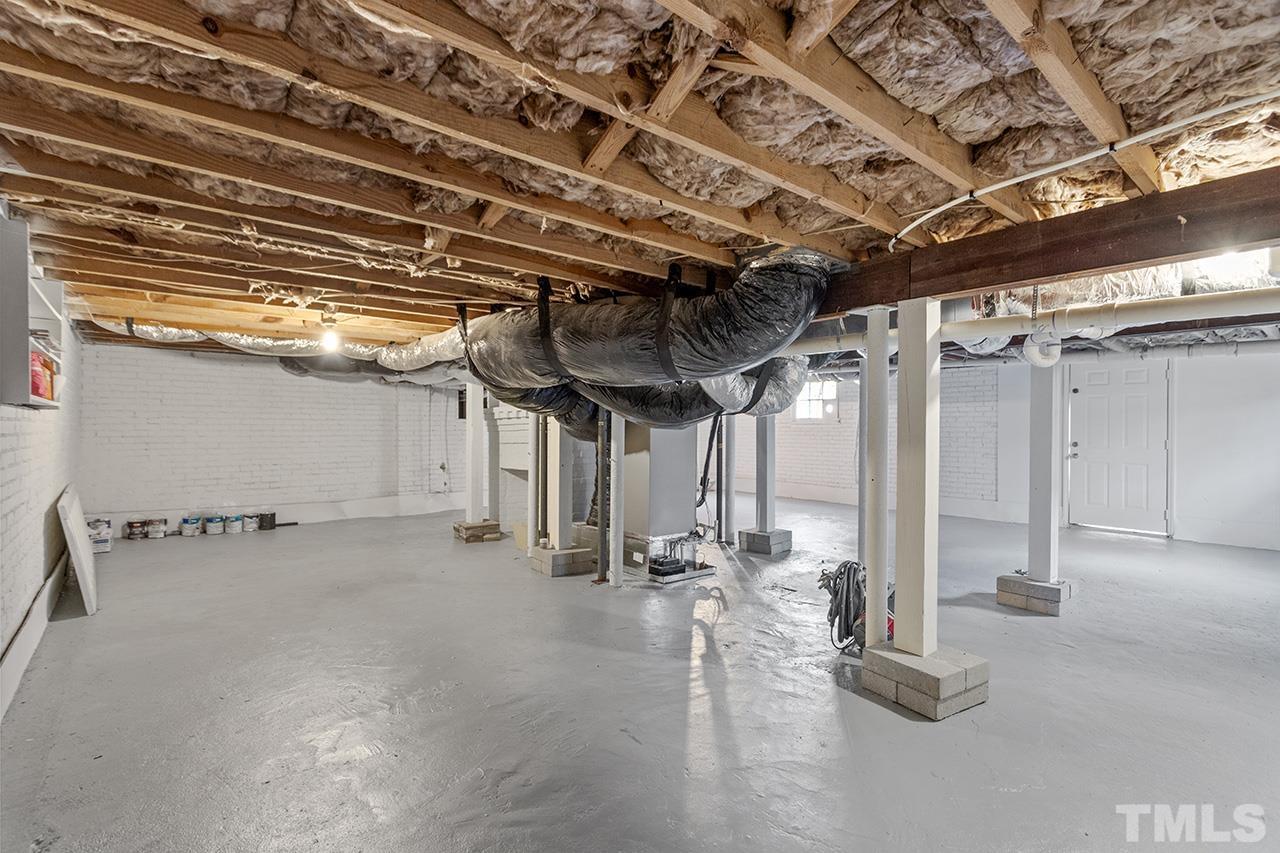 704 Dixie Trail Raleigh, NC 27607 - Photo 30 of 31 a view of a room with gym equipment